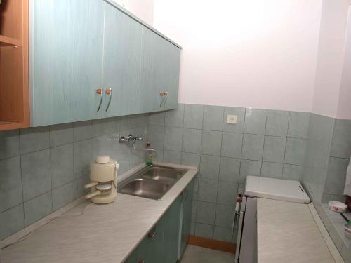 A bathroom at Holiday home in Balatonmariafürdo 19576