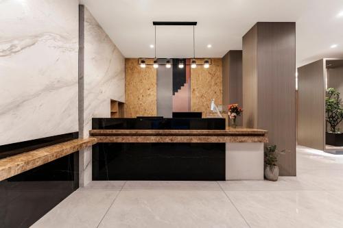 Vstupní hala nebo recepce v ubytování 重庆陌隅酒店 - 人民大礼堂地铁站店