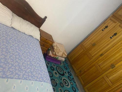 Postel nebo postele na pokoji v ubytování Chefchaouen