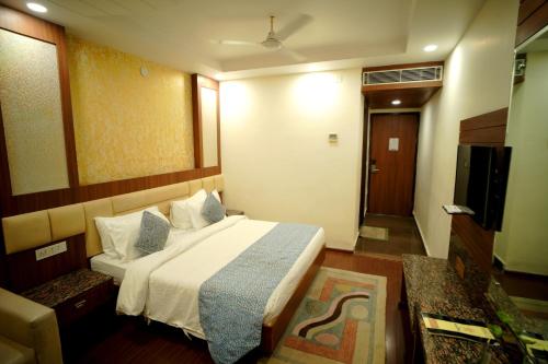Hotel Kalka Royalにあるベッド