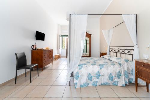 Katil atau katil-katil dalam bilik di Masseria San Biagio