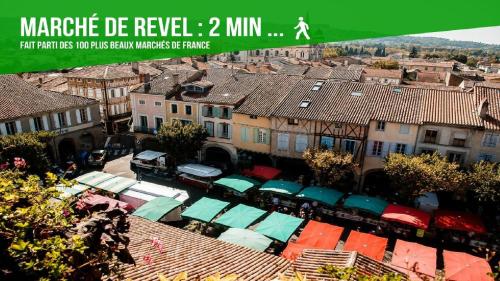 an overhead view of a city with houses and roofs at DUPLEX DU GET in Revel