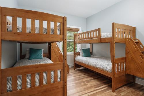 Ένα ή περισσότερα κρεβάτια σε δωμάτιο στο Bike in bike out, Plein air, villégiature Mont-Blanc