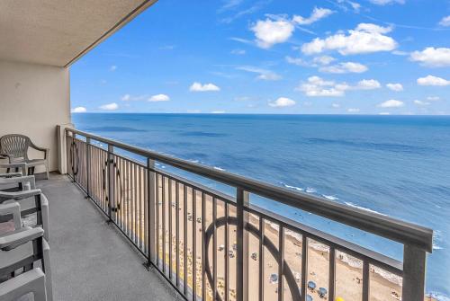 a balcony with a view of the ocean at Oceanview Condo Right On the Beach with Incredible Resort Amenities in Myrtle Beach