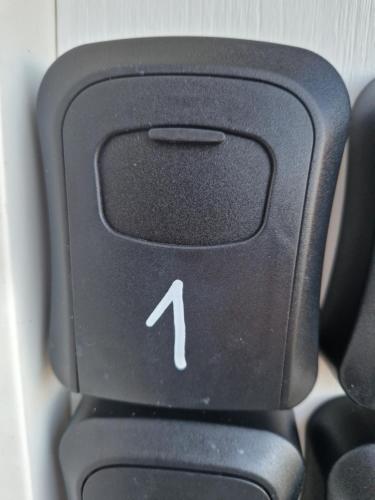 a black computer keyboard with a white arrow on it at penzion U losa in Spořice