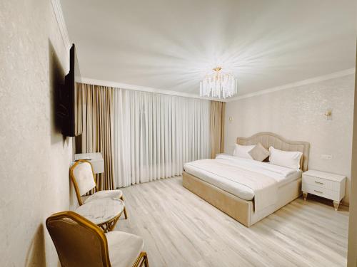 Voodi või voodid majutusasutuse Old Yerevan Boutique Hotel toas