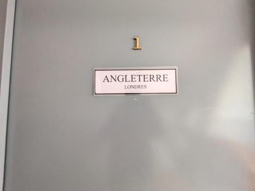 a sign on a door that reads interpreter journeys at Chateau de Quesmy in Quesmy