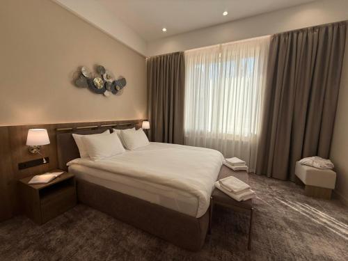 Sofievsky Posad Hotelにあるベッド