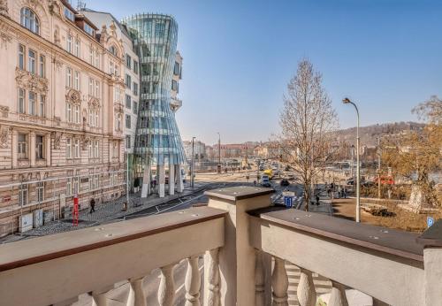 a view of a city with buildings and a glass building at River Dance Suites by Adrez in Prague