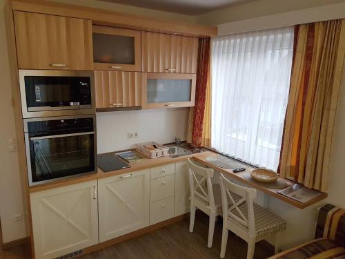 Hotel Kollerhofにあるキッチンまたは簡易キッチン