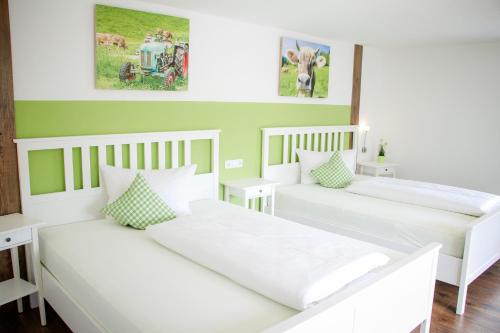 Postel nebo postele na pokoji v ubytování Ferienhaus Zum alten Kuhstall