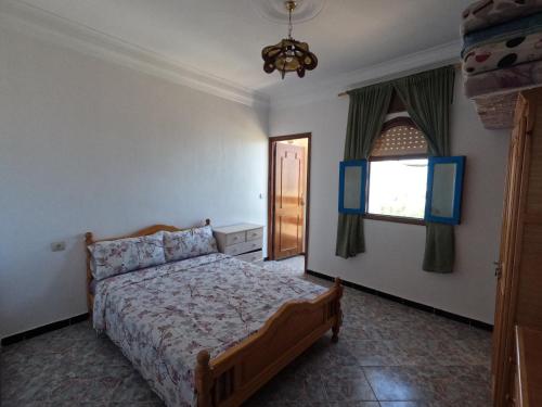 Una cama o camas en una habitación de Appartement spacieux avec vue mer
