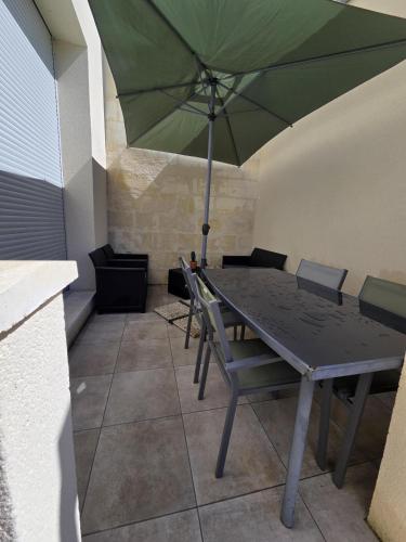 Patio nebo venkovní prostory v ubytování Résidence Pompidou Libourne