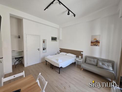 Ένα ή περισσότερα κρεβάτια σε δωμάτιο στο Sicynum