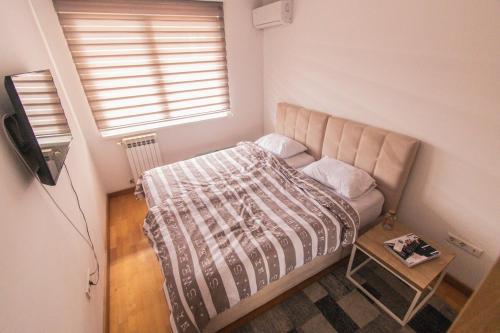 Ένα ή περισσότερα κρεβάτια σε δωμάτιο στο VIP Apartments - Stup Boulevard