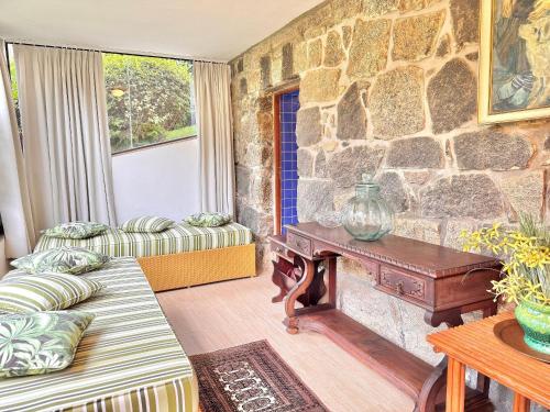 Χώρος καθιστικού στο Casa com vista para as montanhas