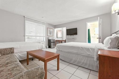 Katil atau katil-katil dalam bilik di iCheck Inn Motel