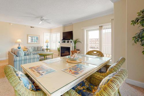 a living room with a table and chairs at Condo 4100 #201 in Ocean City