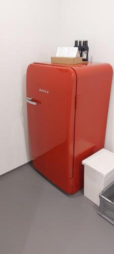 two red suitcases are sitting next to each other at BikeHikeSleep Apartments in Sasbachwalden