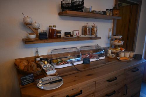 a wooden counter with food on top of it at Gästehaus Pürstl-Kocher in Schladming