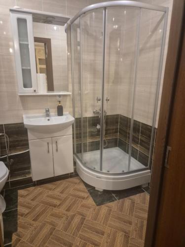 Ένα μπάνιο στο Apartament confortabil