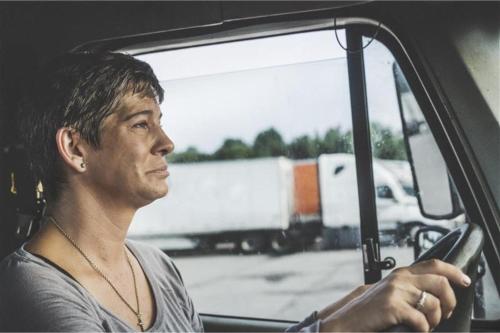 a man sitting in a truck looking out the window at Studio 6-Richmond, VA - I-64 West in Richmond