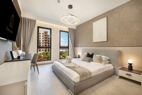 a bedroom with a large bed and a large window at Elegant Stay with Pool & Gym Near Iconic Landmarks in Dubai