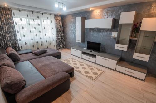 Posezení v ubytování Central Apartament Fălticeni