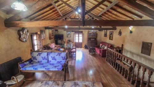 an overhead view of a living room with a couch at Casa rural Tío Quico in Granja de Moreruela