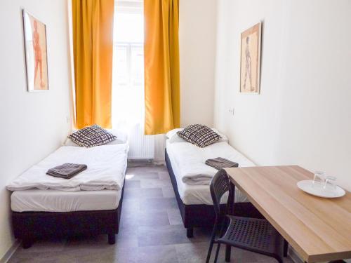 Ένα ή περισσότερα κρεβάτια σε δωμάτιο στο Nice room E3 Prague 7