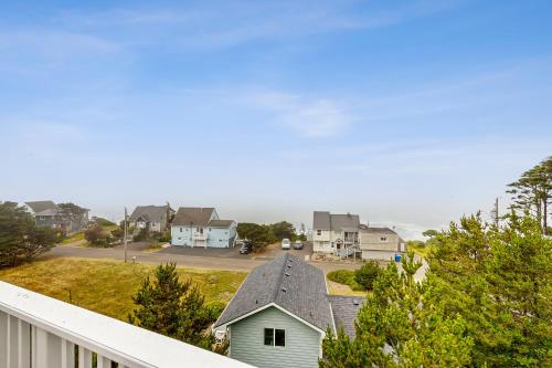 a view of a residential neighborhood with a house at The Bellevue in Lincoln City