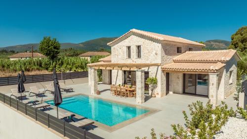 an image of a villa with a swimming pool at Petra Natura Villa in Zakynthos Town
