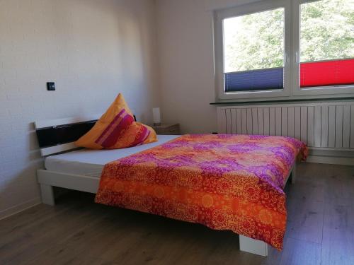 Ένα ή περισσότερα κρεβάτια σε δωμάτιο στο Haus Hochwald