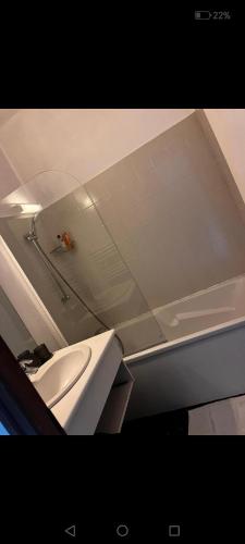 a bathroom with a sink and a toilet at restaurant japonais Tokogine chambre d hote in Listrac-Médoc