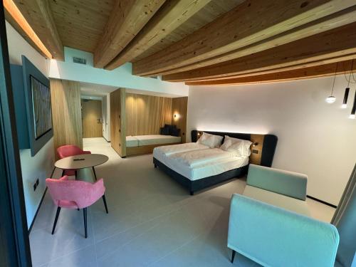Postel nebo postele na pokoji v ubytování Hotel Lido