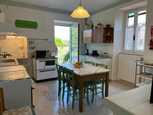 Η κουζίνα ή μικρή κουζίνα στο Casa Vacanza Nonna Lida