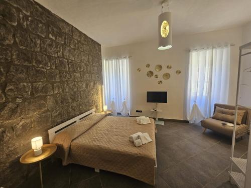 Letto o letti in una camera di Palazzetto dei Priori