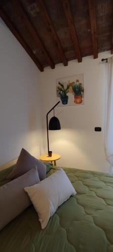 Letto o letti in una camera di Palazzetto dei Priori
