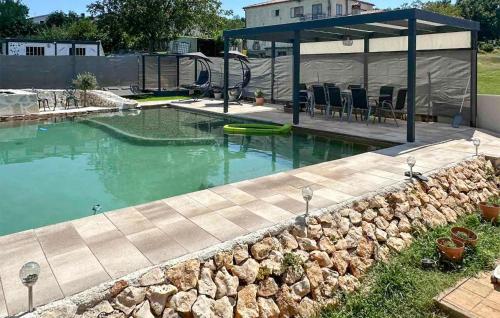 Amazing Apartment In Krsan With Swimming Pool