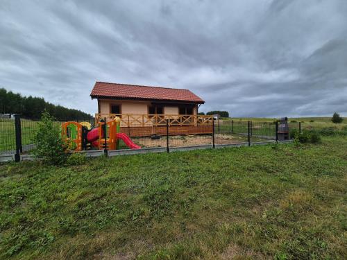 Herní místnost nebo prostor pro děti v ubytování Domek w Skolitach