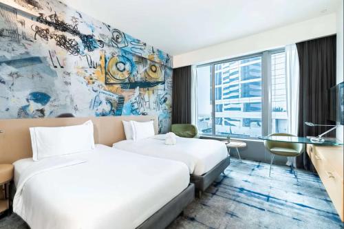Ένα ή περισσότερα κρεβάτια σε δωμάτιο στο Hotel Rakesh