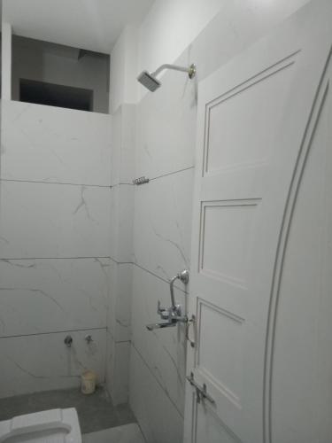 Ένα μπάνιο στο Krishna Guest House Udaipur