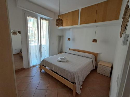 En eller flere senge i et værelse på Le Dune