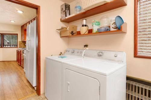 a white washer and dryer in a laundry room at Swiss delight #2244 in Big Bear Lake