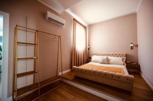 Katil atau katil-katil dalam bilik di Mariarita's Suites