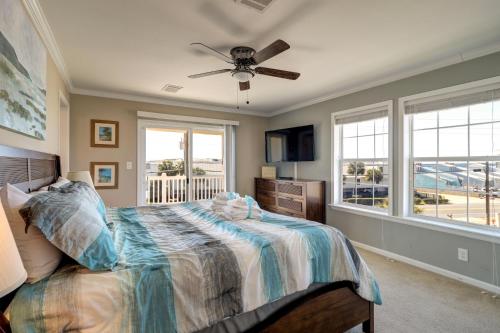 a bedroom with a bed and a ceiling fan at Summer Dayz - Families Love It Here, Just Across from the Beach in Panama City Beach