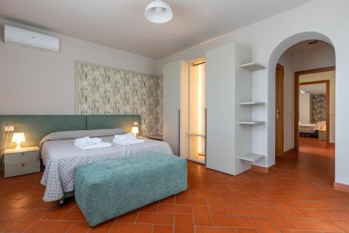 A bed or beds in a room at Villa Selva
