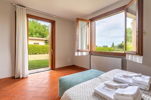 A bed or beds in a room at Villa Selva