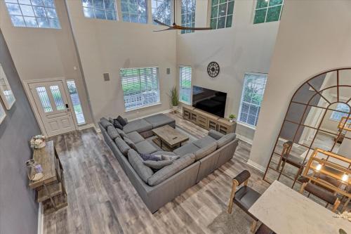 an overhead view of a living room with a couch at The Woodlands Gem with Pool and Spa in The Woodlands