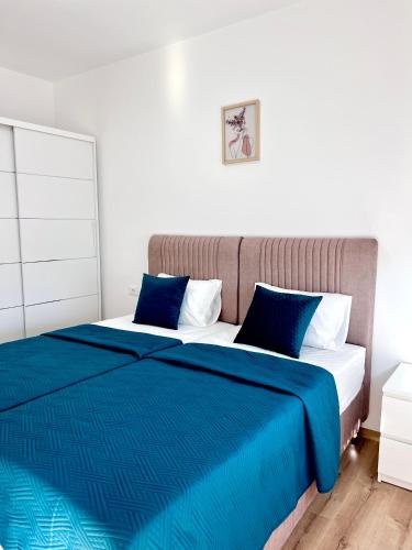 Ένα ή περισσότερα κρεβάτια σε δωμάτιο στο Teo apartmani